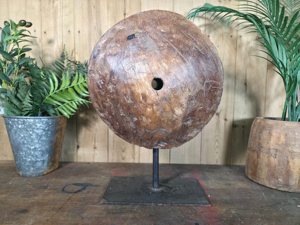 Old Ancient Wabi Sabi Rustic Salvaged Wooden Pulley Cart Wheel Mounted on stand